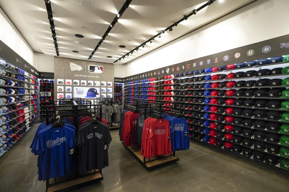 A display of baseball caps are shown at the MLB Flagship store Wednesday, Sept. 30, 2020, in New York. Major League Baseball’s first retail store opens Friday. (AP Photo/Frank Franklin II)