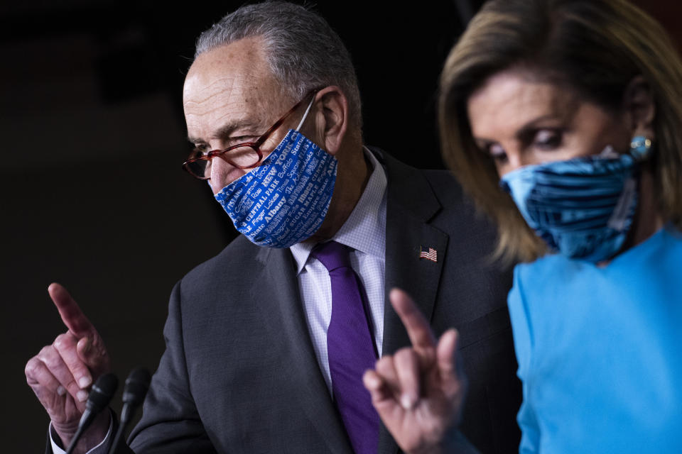 UNITED STATES - NOVEMBER 12: Speaker of the House Nancy Pelosi, D-Calif., and Senate Minority Leader Charles Schumer, D-N.Y., conduct a news conference to discuss the House passed Heroes Act and coronavirus relief legislation in the Capitol Visitor Center on Thursday, November 12, 2020. (Photo By Tom Williams/CQ-Roll Call, Inc via Getty Images)