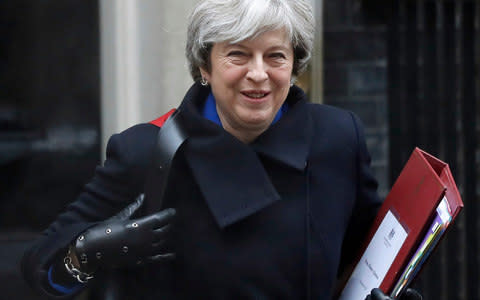 Prime Minister Theresa May wants Britain to drastically reduce plastic waste by 2025 - Credit:  Kirsty Wigglesworth/AP