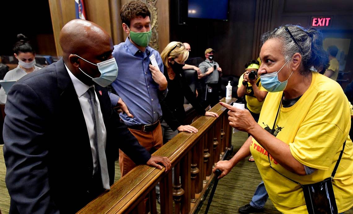 Members of KC Tenants, including Sabrina Davis, right, demanded and got a meeting with Kansas City Mayor Quiton Lucas, left, at City Hall last year. The group was there to protest the mayor’s housing trust fund ordinance. After most of the group left the council chambers, Davis stopped to voice her concerns.