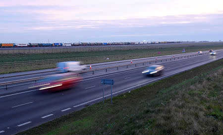 Lorries are seen queue at the Manston Airport waiting to do a test drive to the Port of Dover during a trial of how road will cope in case of a "no-deal" Brexit, Kent, Britain January 7, 2019. REUTERS/Toby Melville