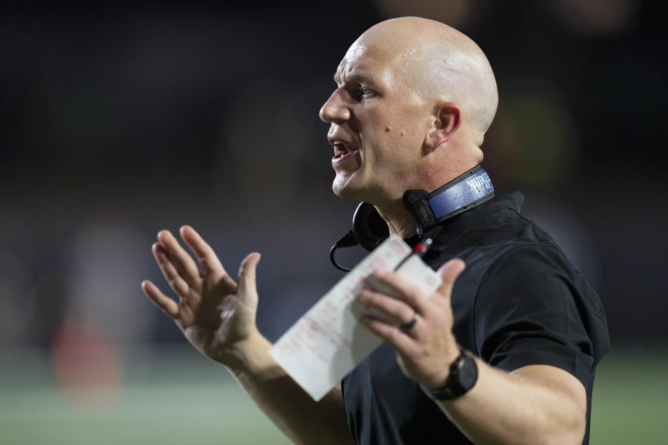 Vanderbilt head coach Clark Lea yells from the sideline in the first half of an NCAA college football game against Hawaii, Saturday, Aug. 26, 2023, in Nashville, Tenn. (AP Photo/George Walker IV)