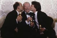 <p>Laurence Olivier (center) won the Cecil B. DeMille Award in 1983.</p>