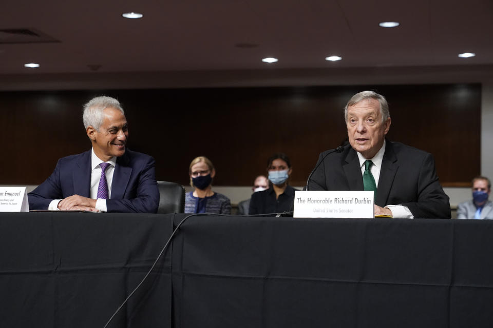 U.S. Ambassador to Japan nominee Rahm Emanuel, left, listens as Senate Majority Whip Richard Durbin of Ill., speaks in support of Emanuel's nomination before the Senate Foreign Relations Committee on Capitol Hill in Washington, Wednesday, Oct. 20, 2021. (AP Photo/Patrick Semansky)