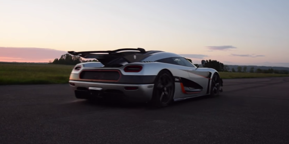 <p>As an automotive superlative, the Koenigsegg One:1 has <a rel="nofollow noopener" href="http://www.roadandtrack.com/motorsports/videos/a25921/koenigsegg-one1-0-300km-h-0-record/" target="_blank" data-ylk="slk:1340 hp on tap;elm:context_link;itc:0;sec:content-canvas" class="link ">1340 hp on tap</a> moving just under 3000 lbs. Named for its power-to-weight ratio—1340 hp moving an equal number of kilograms, just under 3000 lbs—it's <a rel="nofollow noopener" href="http://www.roadandtrack.com/motorsports/videos/a26128/koenigsegg-one1-sets-record-lap-at-spa/" target="_blank" data-ylk="slk:absolutely wild to listen to;elm:context_link;itc:0;sec:content-canvas" class="link ">absolutely wild to listen to</a>.</p>