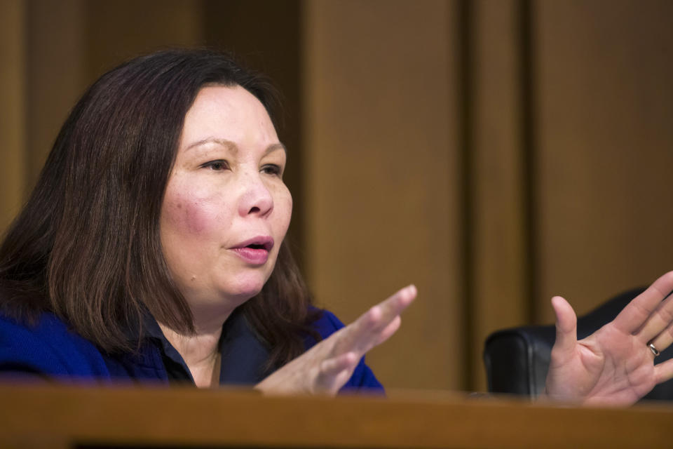 FILE - In this March 27, 2019 file photo, Sen. Tammy Duckworth, R-Ill., speaks during a Senate Transportation subcommittee on commercial airline safety, on Capitol Hill, in Washington. Duckworth has returned to Iraq for the first time since the helicopter she was piloting was shot down during Operation Iraqi Freedom in 2004. The Illinois Democrat said Friday, April 26, 2019, that she led a bipartisan congressional delegation on a "whirlwind" trip last week. (AP Photo/Alex Brandon File)