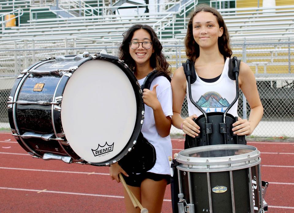 Kiera Martin (left) and Addison Daversa are Jupiter High School sophomores and members of its marching band.