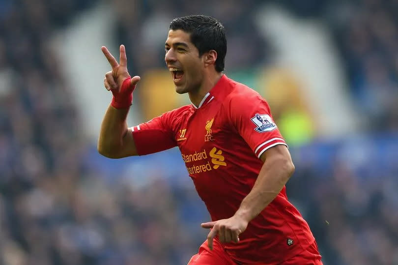 Luis Suarez celebrates for Liverpool