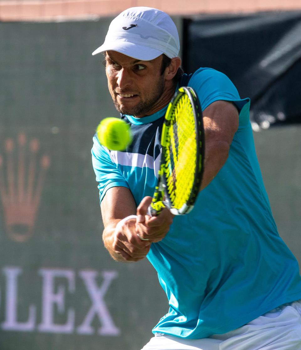 Aleksandar Vukic hits to Novak Djokovic during round two of the BNP Paribas Open in Indian Wells, Calif., Saturday, March 9, 2024.