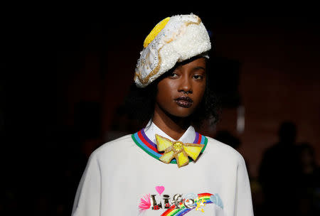 A model presents a creation by Indian designer Manish Arora as part of his Spring/Summer 2017 women's ready-to-wear collection during Fashion Week in Paris, France September 29, 2016. REUTERS/Gonzalo Fuentes