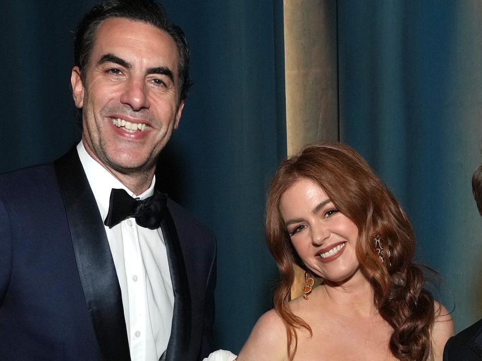 isla fisher and sacha baron in 2022