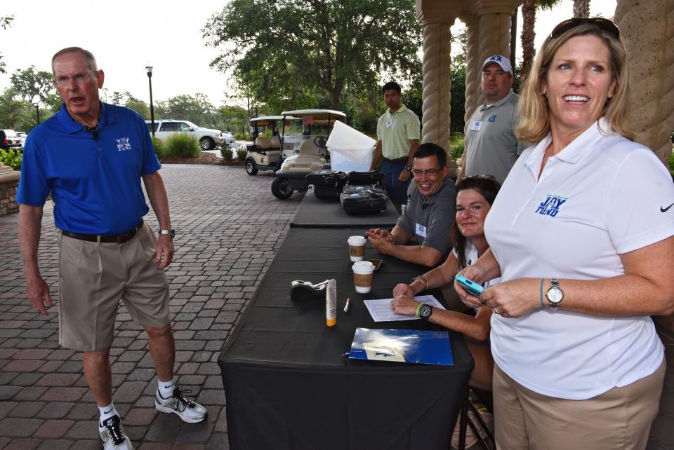 Tom Coughlin (left) and daughter Keli Coughlin, executive director of the Jay Fund, greet arrivals at the 22nd annual Tom Coughlin Jay Fund Celebrity Golf Classic in 2017. Proceeds go to the Jay Fund, which supports families with children battling cancer.