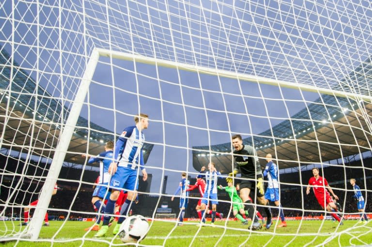 Hertha's goalkeeper Rune Jarstein reacts after Munich's Robert Lewandowski scores a late equaliser during their Bundesliga match on February 18, 2017