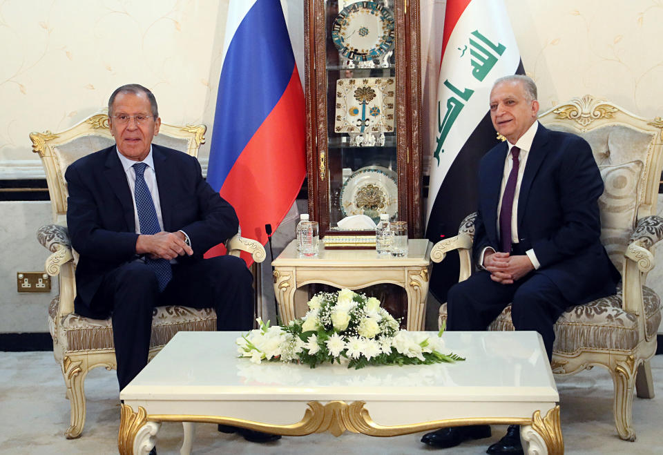 Iraqi Foreign Minister Mohamed Alhakim, right, meets with his visiting Russian counterpart Sergey Lavrov at the Ministry of Foreign Affairs in Baghdad, Iraq, Monday, Oct. 7, 2019. (AP Photo/Hadi Mizban)