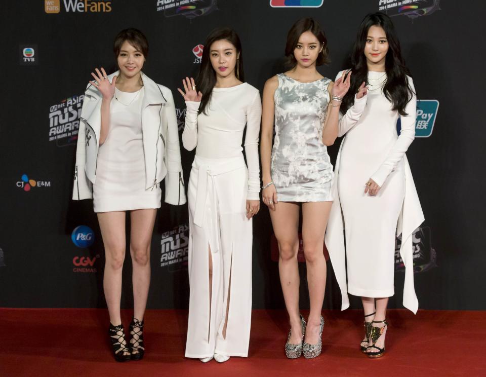 South Korean girl group Girl's Day pose on the red carpet as they attend the 2014 Mnet Asian Music Awards (MAMA) in Hong Kong