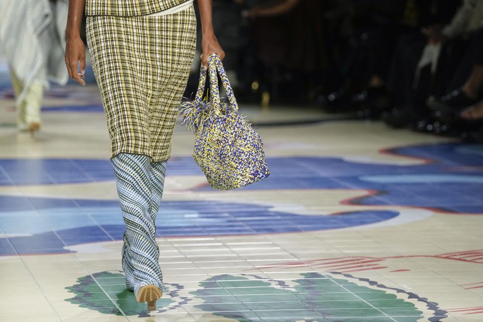 A model wears a creation as part of the Bottega Veneta women's Spring Summer 2024 collection presented in Milan, Italy, Saturday, Sept. 23, 2023. (AP Photo/Antonio Calanni)