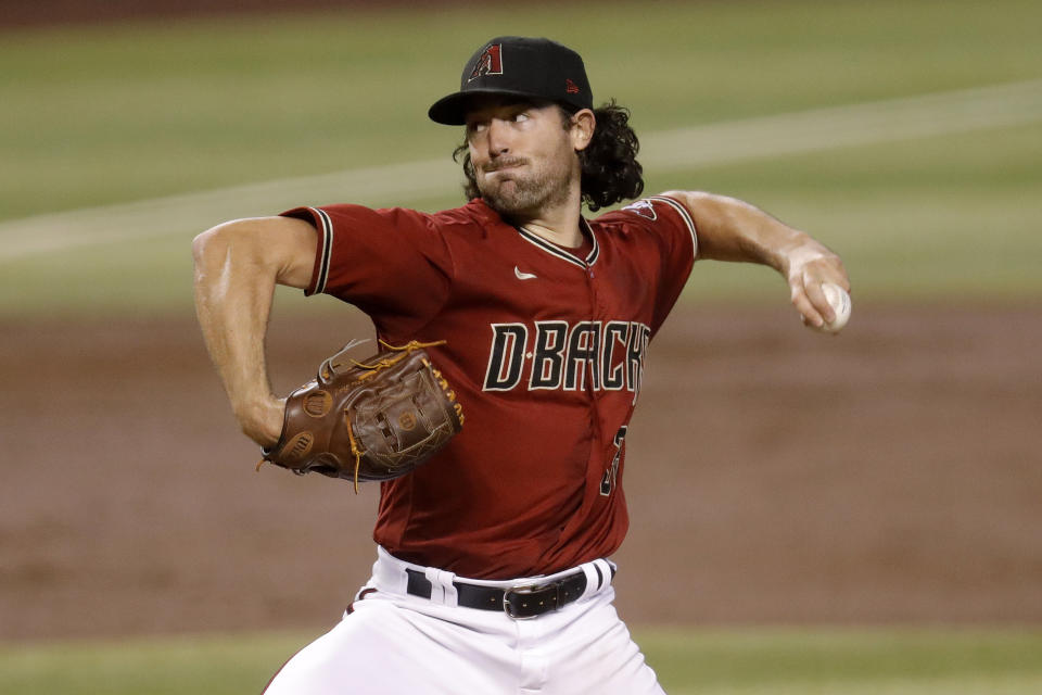 Arizona Diamondbacks starting pitcher Robbie Ray (38) throws against the Houston Astros during the second inning of a baseball game Wednesday, Aug. 5, 2020, in Phoenix. (AP Photo/Matt York)