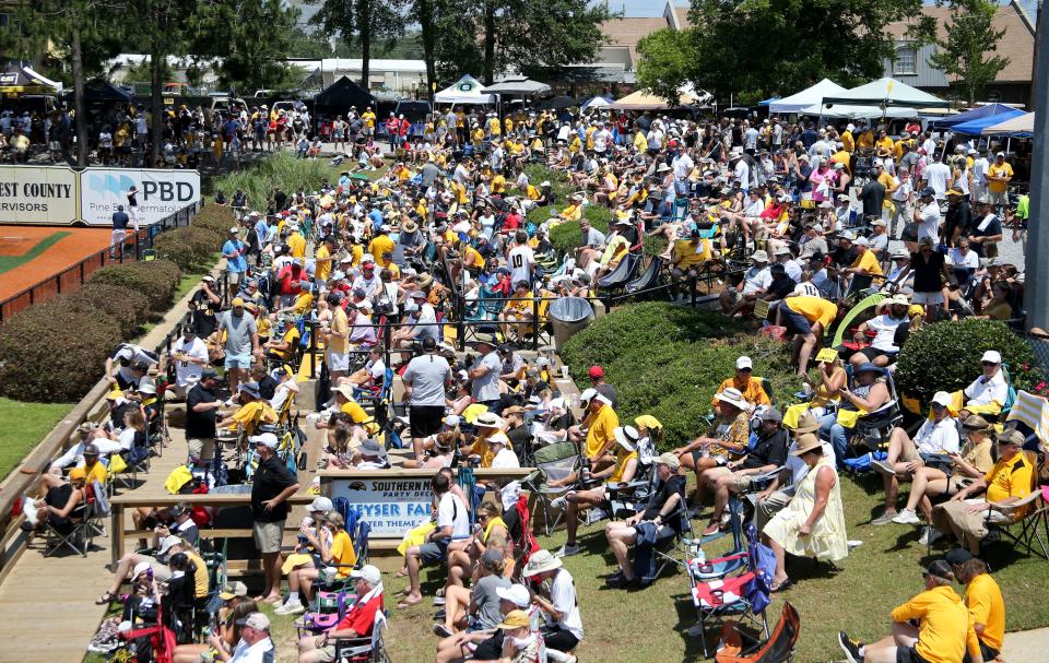 Ole Miss and Southern Miss fans gather before Game 1 of the NCAA Super Regional at Pete Taylor Park.