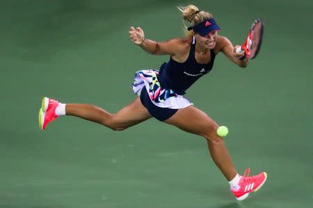 Tennis - Wuhan Open Women's Singles third round - Wuhan, Hubei Province, China - 28/9/16. Angelique Kerber of Germany hits to Petra Kvitova of the Czech Republic. REUTERS/Stringer