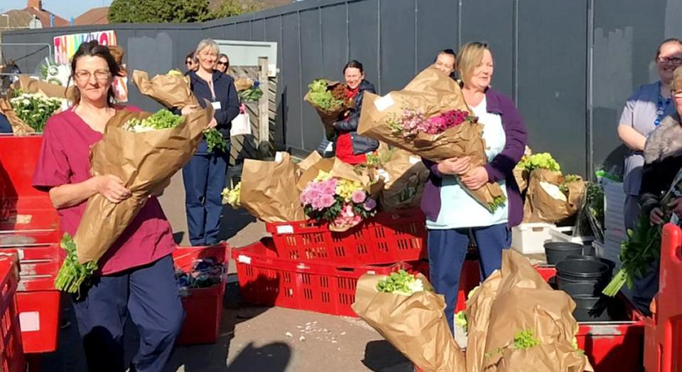 A florist forced to close due to the coronavirus has given away its stock of flowers to NHS staff (SWNS)