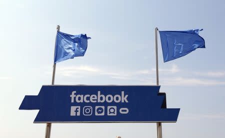 The logo of the social network Facebook is seen on a beach during the Cannes Lions Festival in Cannes, France, June 21, 2017. REUTERS/Eric Gaillard