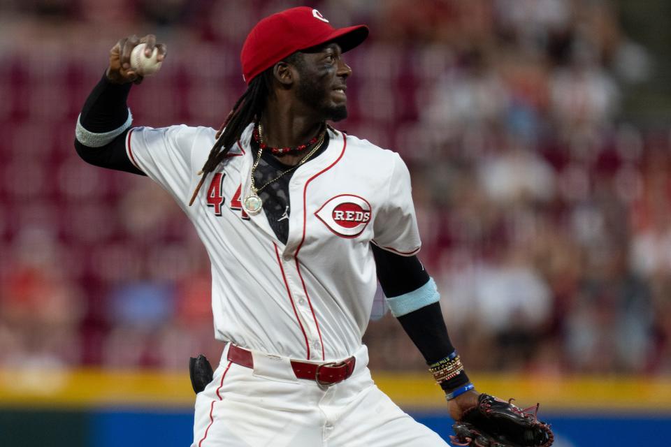 Reds shortstop Elly De La Cruz throws to first base for an out in the ninth inning against the Cardinals at Great American Ball Park on August 13, 2024