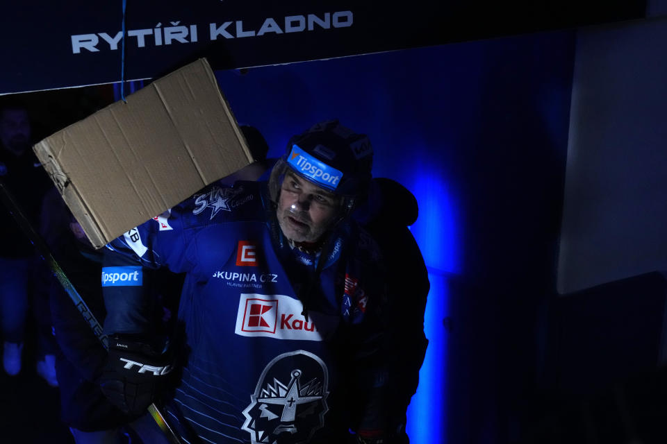 Jaromir Jagr, of Kladno Knights, arrives for the first Czech hockey league match against Ceske Budejovice in Kladno, Czech Republic, Sunday, Jan. 21, 2024. In his 36th season as a professional hockey player, Jagr will take a short break from the Czech league this week and travel to Pittsburgh, where he made his name in the NHL with the Penguins and where his No. 68 jersey will be retired at a ceremony on Sunday. Then it’s quickly back to the Czech Republic to prepare for the next game with the Kladno Knights, who are struggling in last place in the domestic league after a 17-game losing streak. (AP Photo/Petr David Josek)