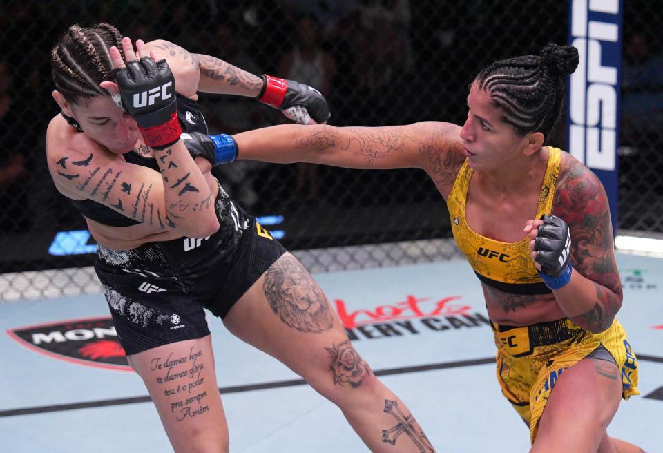 LAS VEGAS, NEVADA – AUGUST 10: (RL) Pannie Kianzad of Iran punches Karol Rosa of Brazil in a bantamweight fight during the UFC Fight Night event at UFC APEX on August 10, 2024 in Las Vegas, Nevada . (Photo by Al Powers/Zuffa LLC)