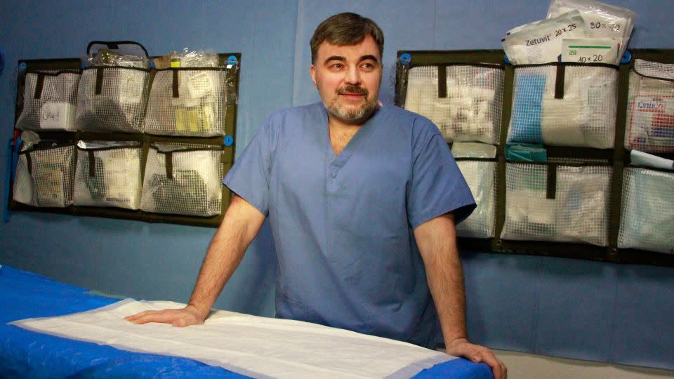 Dr. Sviatoslav Mykytiuk serves at a medical point in eastern Ukraine, where soldiers are brought from the frontlines. - Ivana Kottasová/CNN