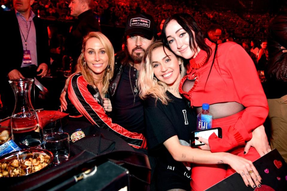 Half of the Cyrus family in sunnier times. Getty Images for iHeartMedia