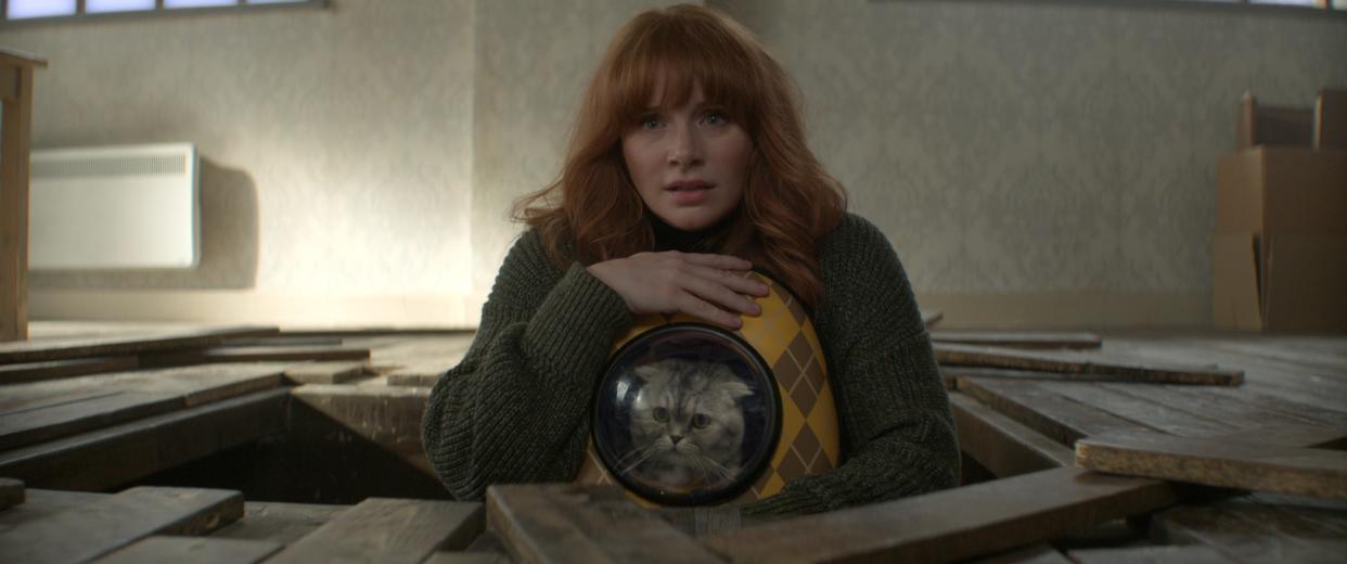 Elly Conway (Bryce Dallas Howard) and Alfie the cat (Chip) escape danger in "Argylle."