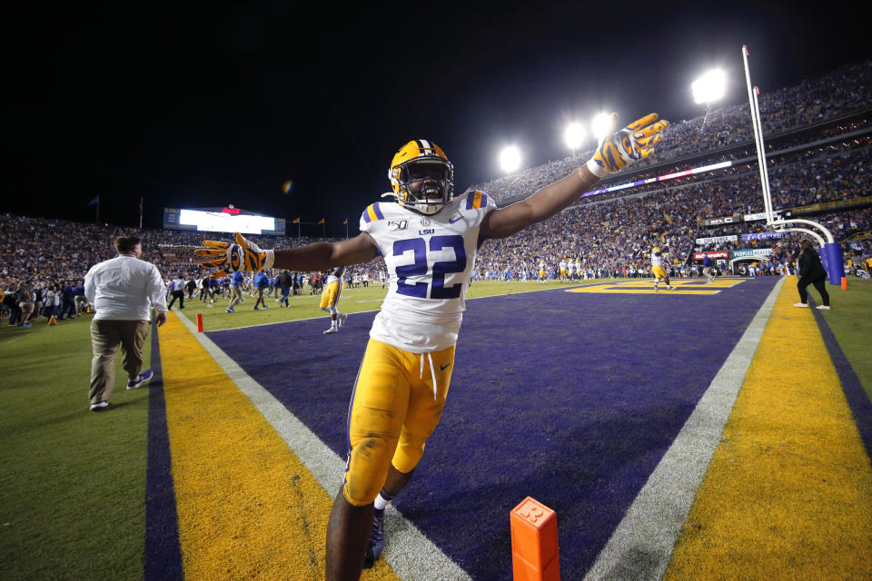 LSU running back Clyde Edwards-Helaire (22) celebrates after the team defeated Florida 42-28 in an NCAA college football game in Baton Rouge, La., Saturday, Oct. 12, 2019. (AP Photo/Gerald Herbert)