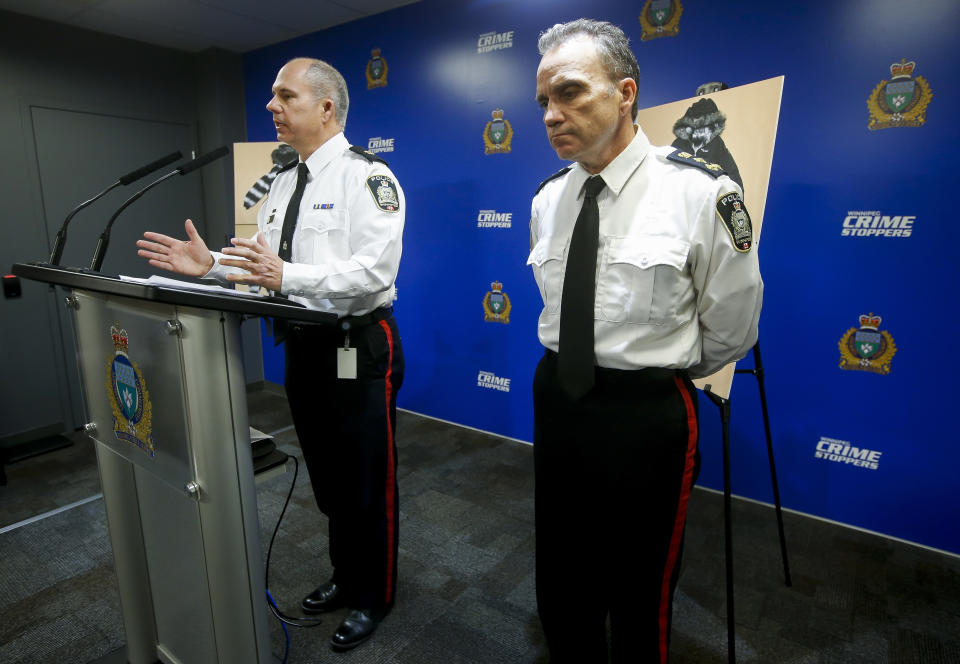 Winnipeg Police Inspector Shawn Pike, left, and Chief Danny Smyth, right, provide an update to an ongoing homicide investigation in Winnipeg, Manitoba, Thursday, Dec. 1, 2022. Police alleged Thursday that Jeremy Skibicki, of Canada, previously charged with murdering an Indigenous woman also killed three other women — two also confirmed to be Indigenous and one believed to be. (John Woods/The Canadian Press via AP)