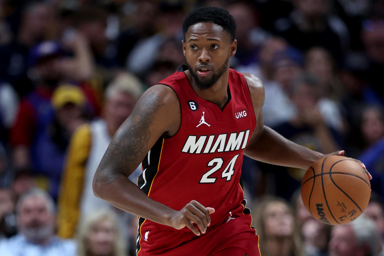 DENVER, COLORADO - JUNE 12: Haywood Highsmith #24 of the Miami Heat dribbles the ball during the second quarter against the Denver Nuggets in Game Five of the 2023 NBA Finals at Ball Arena on June 12, 2023 in Denver, Colorado. NOTE TO USER: User expressly acknowledges and agrees that, by downloading and or using this photograph, User is consenting to the terms and conditions of the Getty Images License Agreement. (Photo by Matthew Stockman/Getty Images)