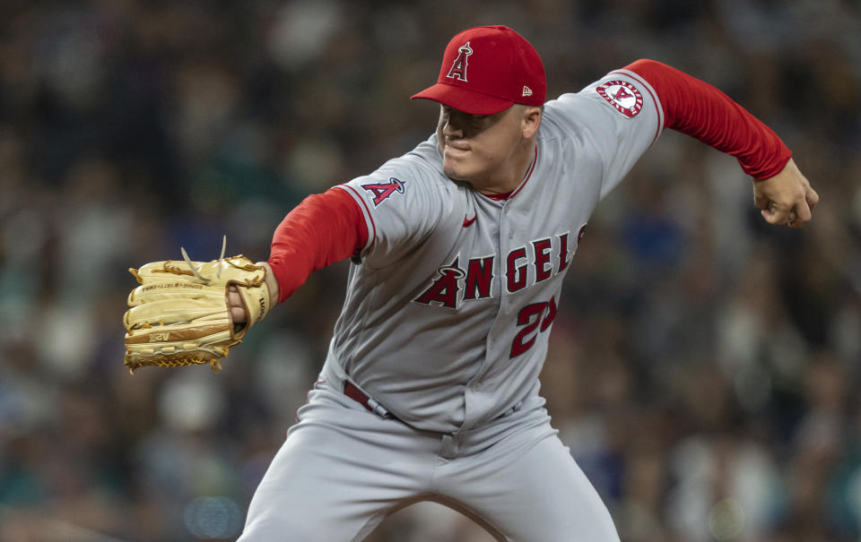 Los Angeles Angels reliever Aaron Loup throws during the sixth inning of the team's baseball game against the Seattle Mariners, Friday, Aug. 5, 2022, in Seattle. (AP Photo/Stephen Brashear)