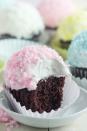 <p>Flaked coconut (in gorgeous pastel colors) gives these cupcakes a wonderful snowball effect.</p><p><strong><a href="http://bakingamoment.com/snowball-cupcakes/" rel="nofollow noopener" target="_blank" data-ylk="slk:Get the recipe at Baking a Moment.;elm:context_link;itc:0;sec:content-canvas" class="link ">Get the recipe at Baking a Moment.</a></strong></p>