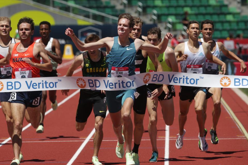 Cooper Teare, center, celebrates his victory in the men's 1,500 meters day three of the USA Track and Field Championships 2022 at Hayward Field in Eugene Saturday June 25, 2022.