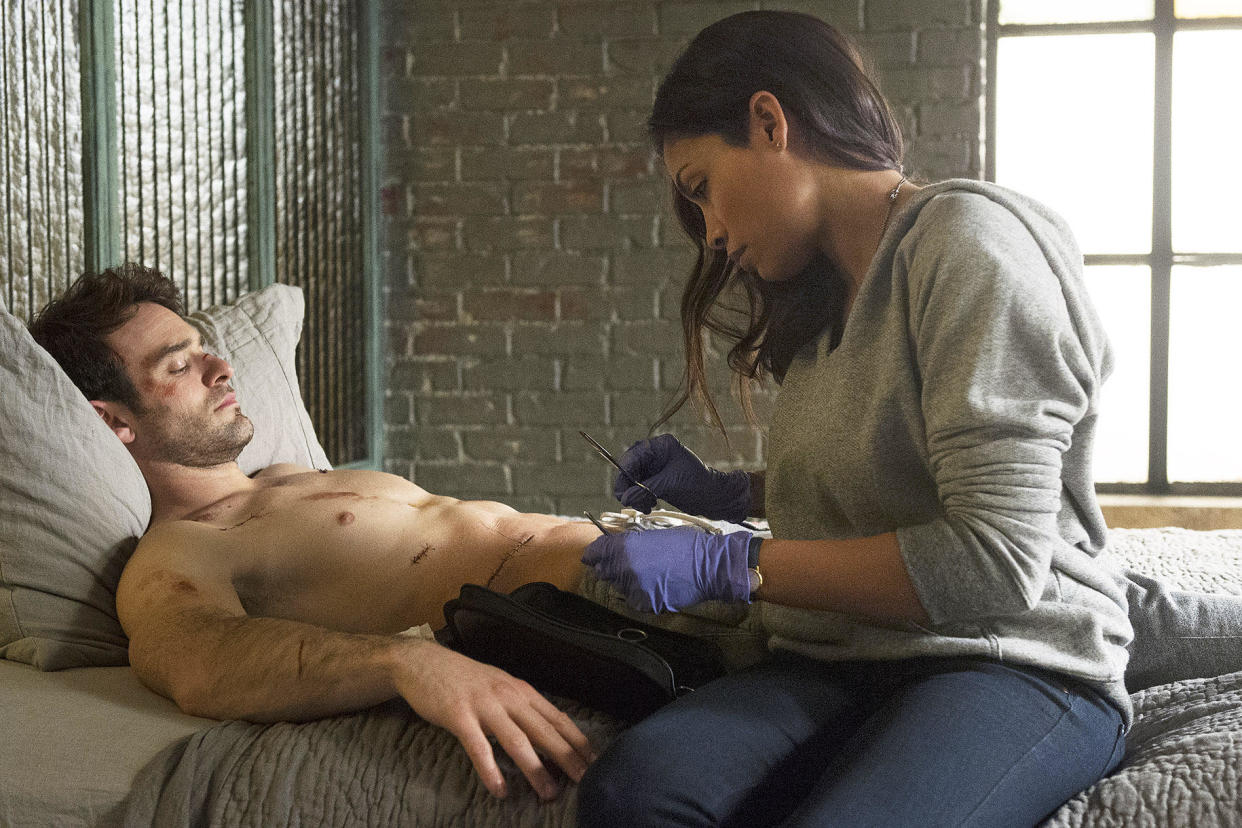 Charlie Cox, Rosario Dawson, MARVEL'S DAREDEVIL | Photo Credits: Barry Wetcher/Netflix