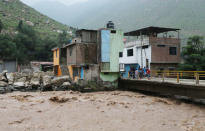 View of flooded homes after the Rimac river overflowed near the Central Highway in Huarochiri, Lima, Peru, March 23, 2017. REUTERS/Guadalupe Pardo