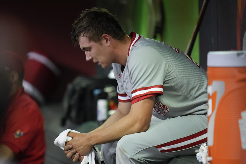 Canada pitcher Mitch Bratt sits in the dugout after being pulled during the first inning of a World Baseball Classic game against the United States in Phoenix, Monday, March 13, 2023. (AP Photo/Godofredo A. Vásquez)