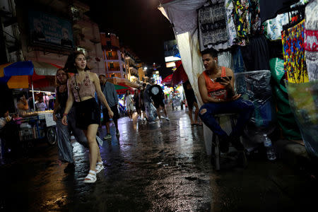 Street vendors sell clothes in Khaosan Road in Bangkok, Thailand, September 12, 2018. REUTERS/Soe Zeya Tun