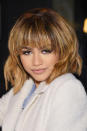 Darf es etwas blond sein? Na klar! 2016 trug Zendaya in New York honigblonde Strähnchen, einen fransigen Pony und leichte Wellen im Haar. (Bild-Copyright: Getty)