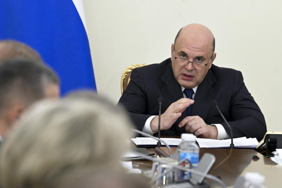 Russian Prime Minister Mikhail Mishustin chairs a meeting with his deputies in Moscow, Russia, Monday, June 26, 2023. (Alexander Astafyev, Sputnik, Government Pool Photo via AP)