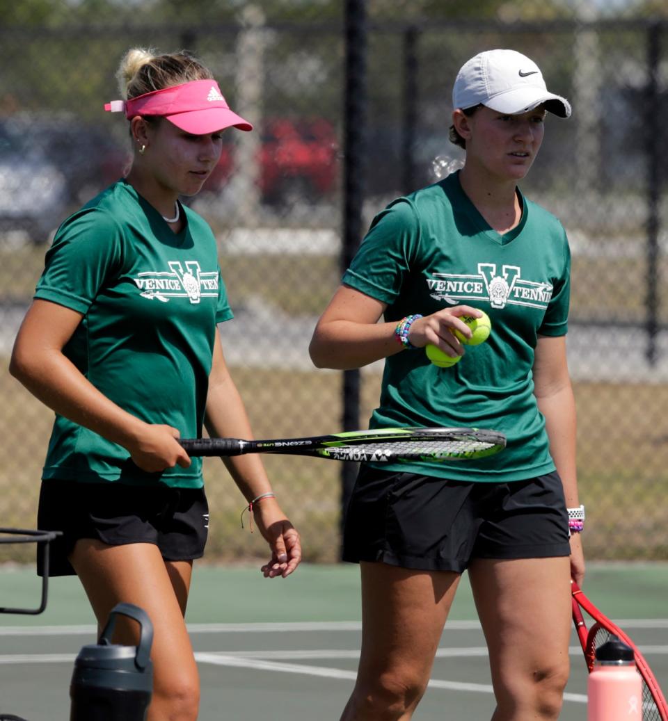 Venice's Nicole Cierniak, left, and Mikayla Faure during a break in No. 1 doubles against Lakewood Ranch in the Class 4A regional semifinal Tuesday, April 19, 2022, at Venice High.