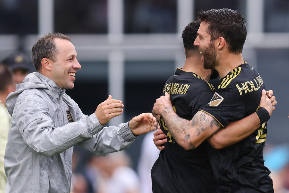 FORT LAUDERDALE, FLORIDA - MARCH 12: Ismael Tajouri #19 of Los Angeles FC celebrates with Ryan Hollingshead #24 and head coach Steve Cherundolo after scoring a goal against Inter Miami CF during the second half at DRV PNK Stadium on March 12, 2022 in Fort Lauderdale, Florida. (Photo by Michael Reaves/Getty Images)