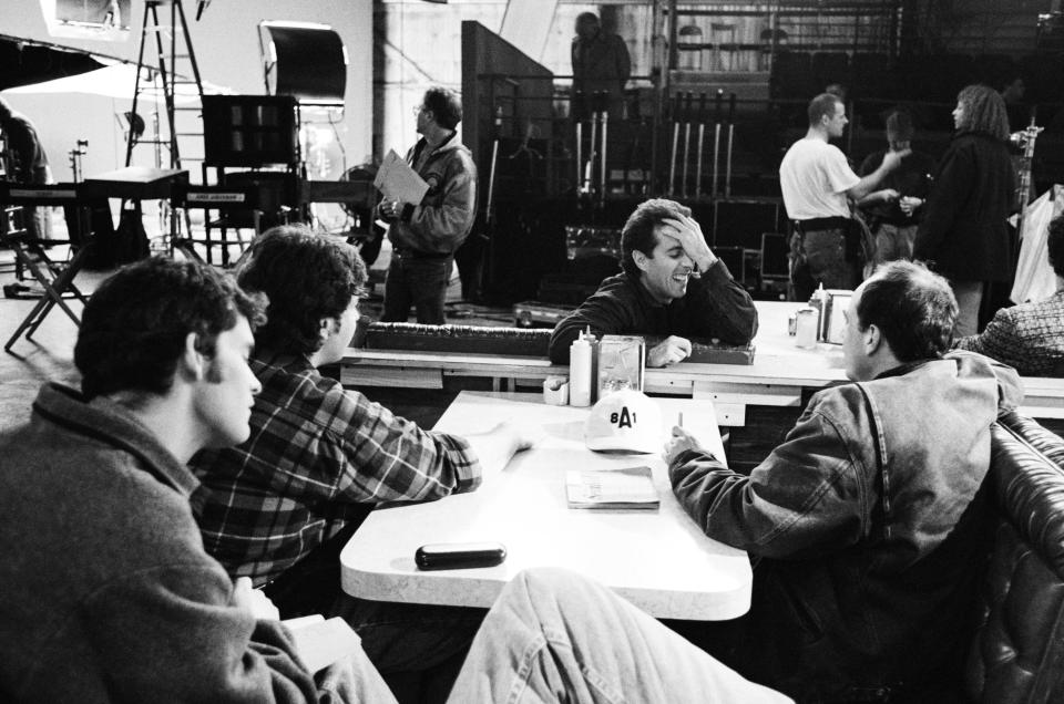 STUDIO CITY, CA - APRIL 16: Jerry Seinfeld (center) meets with his writers on the set of his hit television show 'Seinfeld' during the filming of its final episode, April 16, 1998 in Studio City, California. (Photo by David Hume Kennerly/Getty Images