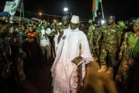 Gambia's incumbent president Yahya Jammeh (C) has refused to leave office, ignoring a midnight deadline Wednesday to stand down or face military action