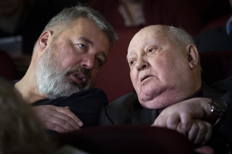 FILE - In this Nov. 8, 2018 file photo, former Soviet leader Mikhail Gorbachev, right, and Dmitry Muratov, former editor of Novaya Gazeta attend the Moscow premier of a film made by Werner Herzog and British filmmaker Andre Singer based on their conversations, in Moscow, Russia. The Norwegian Nobel Committee on Friday, Oct. 8, 2021 awareded the Nobel Peace Prize to journalists Maria Ressa of the Philippines and Dmitry Muratov of Russia for their fight for freedom of expression. (AP Photo/Alexander Zemlianichenko, File)