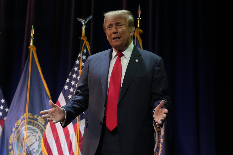 Republican presidential candidate former President Donald Trump taking the stage during a campaign stop in Rochester, N.H., Sunday, Jan. 21, 2024. (AP Photo/Charles Krupa)