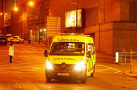 An ambulance drives away from the Manchester Arena, where U.S. singer Ariana Grande had been performing, in Manchester, northern England, Britain, May 23, 2017. REUTERS/Andrew Yates